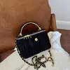 Bolso tipo caja de bola dorada pequeña con cadena plisada estilo Chanel modelo nuevo 2026 bolso de hombro para maquillaje bordado bolso cruzado