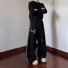 Calça de moletom com bainha curva e tachas cruzadas estilo rua americano para homens e mulheres, calça casual larga com estampa de leopardo da moda para dança jazz