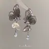 Pendientes Largos con Borla para Mujer, Aretes Colgantes de Mariposa Huecos Tridimensionales en Plata y Oro con un Diseño Elegante y Único