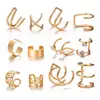 Shein Clip para Hélice de Oreja Hueso Creativo Simple Sin Perforar Juego de Cinco Piezas Pendientes Personalizados Dorados con Corte de Hoja Clip de Oreja en Forma de C