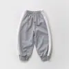 Calça infantil com elástico na cintura, color block, amarração no tornozelo, estilo coreano, coleção outono 2026, unissex, para bebês e crianças maiores, calça esportiva versátil