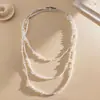 Collar de Perlas de Doble Capa Transfronterizo Europeo y Americano Largo Multicapa Apilable Cadena para Clavícula Moda de Alta Gama Versátil Accesorio de Collar para Mujeres Venta al por Mayor