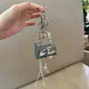 Popular Transfronterizo Primavera y Verano Nuevo Mini Carcasa Bolso de Piel PU Llavero Colgante Llavero para Niña Colgante
