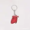 Llavero con forma de corazón temático de enfermera de acrílico transfronterizo, llavero creativo de dibujos animados con forma de corazón simulado, colgante para bolso, regalo