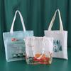 Bolsa de algodão para publicidade com impressão de cor simples no atacado, bolsa de embalagem portátil multicolorida para estudantes, bolsa de armazenamento para doces e presentes