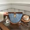 Nova bolsa feminina 2024 Explosions Bucket Bag Outono e inverno Nicho Design Crossbody Bag High-end Trabalho Pequena bolsa