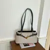 26 bolsos tote nuevos de estilo vintage para mujer para el uso diario, bolsos de hombro de nicho, bolsos cruzados versátiles de gran capacidad