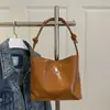 2025 Nova Bolsa de Ombro Cor Sólida Estilo Simples Moda Estilo Hong Kong Cor Vibrante Bolsa de Balde de Alto Padrão Bolsa de Axila de Alta Qualidade