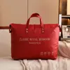 Esta bolsa é para guardar colchas, lembrancinhas de casamento, enxoval, colchas de inverno vermelhas, e é de grande capacidade, dobrável e à prova d'água.