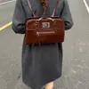 Mochila Feminina de Alta Qualidade 2025 Nova Mochila para Deslocamento Bolsa Escolar para Estudante Universitário Bolsa Tote Transversal de Ombro Único
