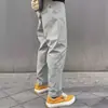 Pantalones casuales estilo americano, nuevos pantalones funcionales de trabajo para exteriores de primavera y otoño, unisex con logo triangular, pantalones versátiles para hombre