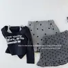 Falda para Niña 2026 Otoño/Invierno Nueva Estilo Coreano Falda de Lunares Línea A para Niñas con Elegantes Bordes Fruncidos