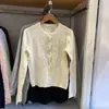 Ropa de mujer estilo japonés 2026 nuevo modelo, cárdigan de punto con cuello redondo y patrón de trenzas, suéter de manga larga, chaqueta de aire acondicionado 488123