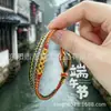 Pulsera de Cuerda Colorida del Festival del Bote del Dragón Bolsita Pequeña del Festival del Bote del Dragón Zongzi Pequeño Cuerda para la Mano Cabeza de Tigre Festival de Mayo Cuerda Colorida Terminada Pequeños Regalos