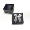 Caja Negra Serie Moño 8*9*5.3cm Caja para Relojes Caja de Joyería Caja para Empaque de Regalo