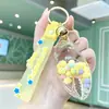 Llavero de cangrejo de pinza con arena movediza y aceite, lindo colgante de frijol de caramelo flotante para llave de coche, accesorio para mochila de estudiante