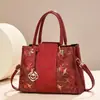 Bolsa de boda roja para mujer, bolso de mano de novia, nuevo modelo 2026, bolso bordado estilo chino, regalo de alta gama, bolso de madre