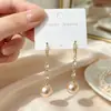 Aretes de Plata S925 Estilo Fragante Perla Asimétricos Estilo Natural Tranquilo Personalidad Temperamento Combinación Total Simples Aretes de Amor