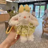 Novo Chaveiro de Coelho de Orelhas Longas Pelúcia Vestido Fofo e Fofo Segurando Flores Boneca Coelho Pingente de Bolsa para Mulheres