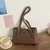 Bolsa Tote Vazada Exquisita de Shuai Mi Modelo Novo 2026 Bolsa Cesta de Férias Elegante de Ombro Único Sob o Braço Bolsa Mãe-Filha Tendência