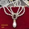 Collar de perlas multicapa vintage Qingdao de la Edad Media, moderno, versátil, con diamantes y gema púrpura, cadena para suéter, juego de aretes