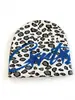 Moda Europeia e Americana Chapéus Outono e Inverno para Homens e Mulheres, Chapéus de Tricô sem Aba para Uso Externo, Chapéus Quentes de Lã Espessa com Estampa de Leopardo Atacado