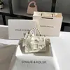 Uma geração de bolsa popular de renda com laço 2024 nova bolsa quadrada pequena bordada de alto padrão atacado
