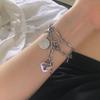 Pulsera de Acero de Titanio con Empalme Cruzado Hueco de Oso en Capas Estilo Europeo y Americano para Hombres y Mujeres, Accesorio de Moda con Personalidad Punk