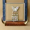 Accesorios de imán para refrigerador de la etnia Miao, piezas estilo chino de fénix y mariposa imitación plata, estilo étnico de plata Miao de nicho, pavo real, área escénica de Guizhou