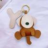 Colgante de llavero de mono U de cuero relleno de algodón de dibujos animados ins celebridad de Internet colgante pequeño exquisito niña mochila escolar colgante de muñeca
