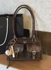 Bolso de Mano de Gama Alta Estilo Bolso de Bolos para Mujer 2025 Otoño e Invierno Nuevo Estilo Lujo Ligero Versátil Nicho Bolso de Hombro Debajo del Brazo Moderno