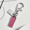 Nuevo Colgante Metálico Rosa Plateado Forma de Corazón Botella de Perfume de Cereza Llavero Accesorio Versátil para Bolsa Venta al por Mayor Dropshipping