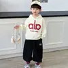 Conjunto Fresco para Niño Estilo Primavera y Otoño Chaqueta Infantil Sudadera con Capucha Conjunto de Tres Piezas 2026 Modelo Nuevo Ropa Deportiva para Niños
