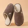 26 pantuflas de algodón de invierno transfronterizas nuevas con marcas verticales, adecuadas para hombres y mujeres, cómodas para uso doméstico, cálidas y antideslizantes