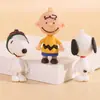 Funda de teléfono de pegamento cremoso DIY Llavero de muñeca Snoopy Cadena de llavero de Charlie el niño de pelo tres Colgante para bolso de cadena