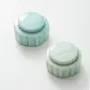 Tarro de té cerámico pequeño tamaño mini tarro de almacenamiento de bálsamo en polvo fragante caja de embalaje tarro de té pequeño 10ml logo imprimible