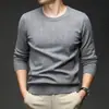 Suéter jacquard de cuello redondo transfronterizo para hombre, nuevo modelo de otoño 2026, color liso, capa interior casual simple, suéter de punto para hombre