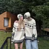 Ropa de Pareja Otoño e Invierno Nueva Blanca Fair Isle Jacquard Retro Tejidos para Hombres y Mujeres Sueltos y Perezosos Tejidos Interiores
