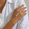 Pulsera de Dedo de Moda Transfronteriza Europea y Americana con Circonita, Cadena de Dedo Simple y Versátil de Cuentas de Arroz, Joyería de Cadena de Anillo de Muñeca de Perla