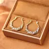 Aretes Dorados de Circonita Ultra Brillantes Trenzados, Lujo Ligero, Moda de Alta Gama, Aretes Elegantes y Únicos, Exquisitos Aretes de Estilo Femenino