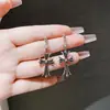 Colección Popular de Pendientes 2025 Pendientes Nuevos Pendientes de Nicho de Gama Alta Diseño Elegante Fábrica de Origen de Yiwu
