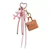 Serie Miu Transfronteriza Bolso Cuadrado Pequeño de Piel Regalo Creativo Billetera para Monedas Llavero Bolsa para Auriculares Colgante Llavero