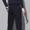 Pantalones Casuales Nuevos de Primavera para Hombre Estilo Coreano Rectos Elásticos Ajuste Delgado Pantalones de Hombre Sueltos Versátiles Pantalones de Negocios Casuales para Hombre