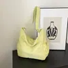 Bolsa de Tecido de Nylon de Nicho para Mulheres 2026 Novo Modelo Bolsa de Ombro para Estudantes para Aula Deslocamento Bolsa Transversal Casual Bolsa Bolinho