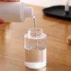 Aceite desmaquillante embotellado, botella vacía portátil de viaje, botella de prensa hidratante para cosméticos, botella de viaje exprimible