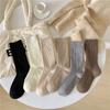 Calcetines de lana nuevos de otoño e invierno para mujer, calcetines de lana con rayas verticales de doble aguja estilo retro japonés, calcetines de color liso hasta media pantorrilla