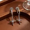 Pendientes de clip para oreja de bobina de mosquito sin dolor con microincrustaciones de circonita, los más vendidos de Amazon para mujer, pendientes de estrella de cuatro puntas de alta gama