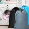 Bolsa de lavandería portátil Amazon Transfronteriza con bolsillo de cordón Bolsa de almacenamiento para el hogar y viajes Bolsa para ropa sucia