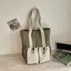 Bolsa de mano tipo tote de color liso estilo japonés de gran capacidad para mujer 2026 Verano Nuevo Simple Casual Bloque de Color para Viajes Diarios Bolso de Hombro Único