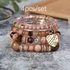 Moda Europea y Americana 2025 Nuevo Estilo Étnico Bohemio Pulsera Multicapa Corazón de Melocotón de Cristal con Cuentas Joyería de Mano para Mujer